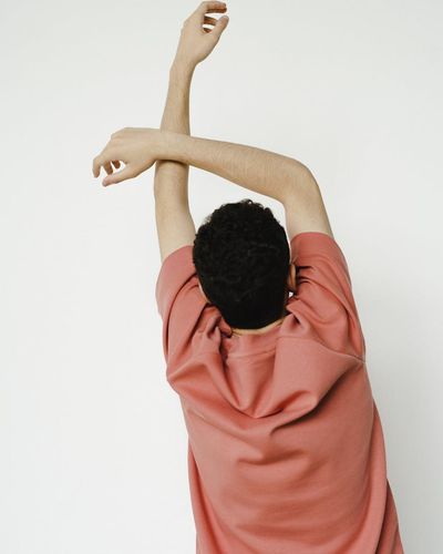 A person in a simple stretching pose.